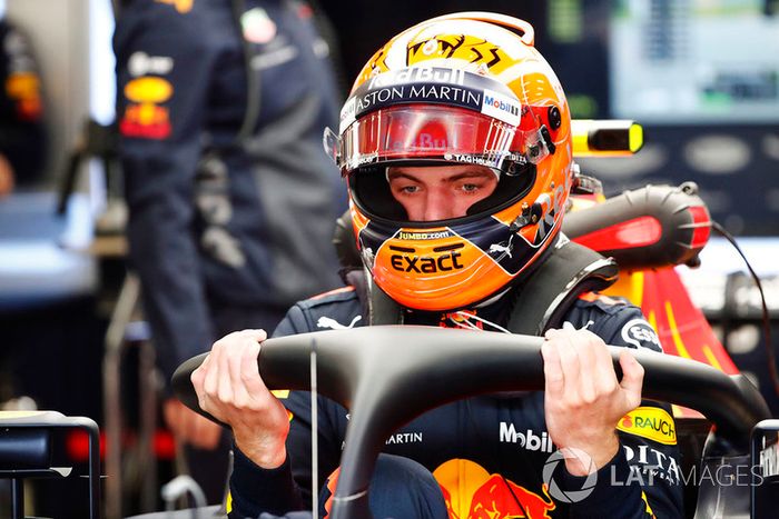Max Verstappen, Red Bull Racing, enters his cockpit