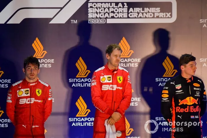 Charles Leclerc, Ferrari, il vincitore della gara Sebastian Vettel, Ferrari e Max Verstappen, Red Bull Racing sul podio