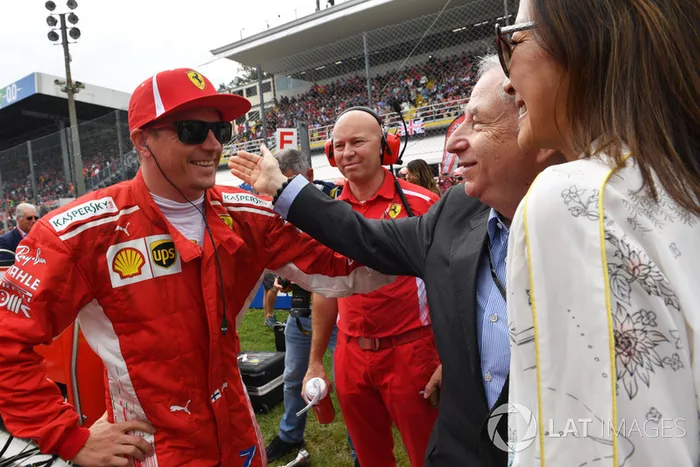 Kimi Raikkonen, Ferrari con Jean Todt, presidente de la FIA, y la mujer de Todt, Michelle Yeoh 
