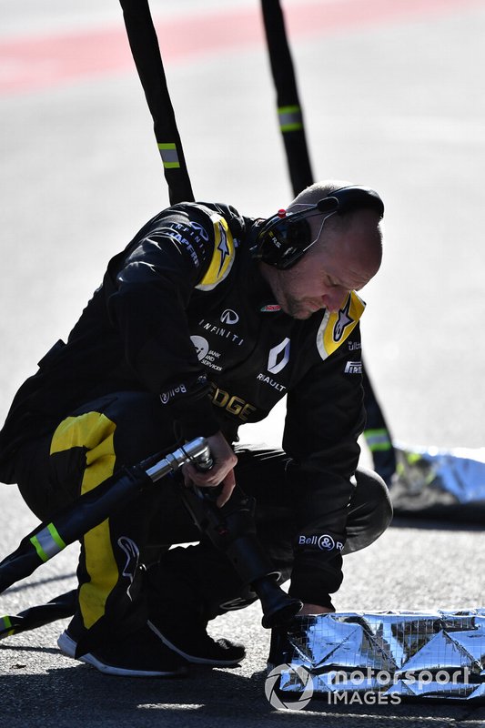 Renault Sport F1 Team mechanic with wheel gun