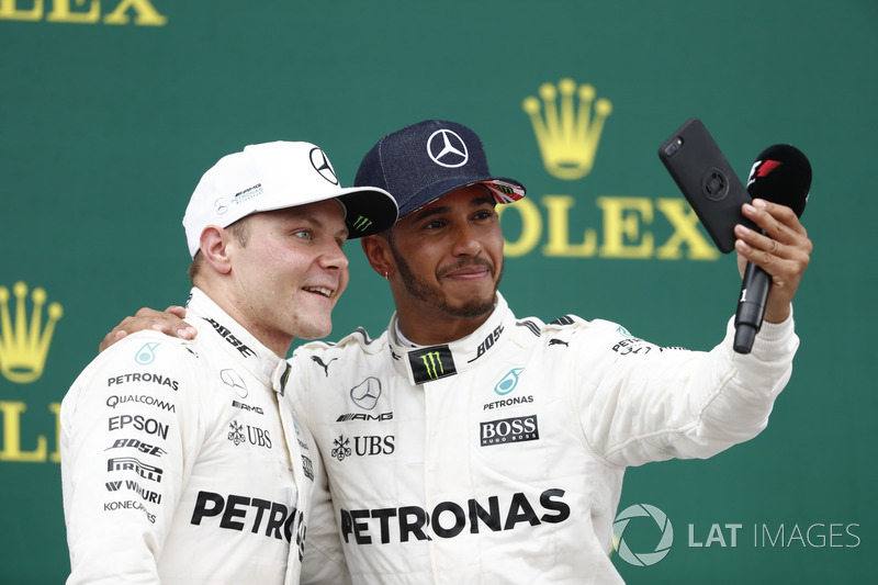 Podium:  Race winner Lewis Hamilton, Mercedes AMG F1, takes a photo of Second place Valtteri Bottas, Mercedes AMG F1