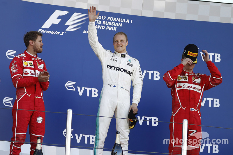 Подиум: победитель Валттери Боттас, Mercedes AMG F1, второе место – Себастьян Феттель, Ferrari, Кими Райкконен, Ferrari, – третье место