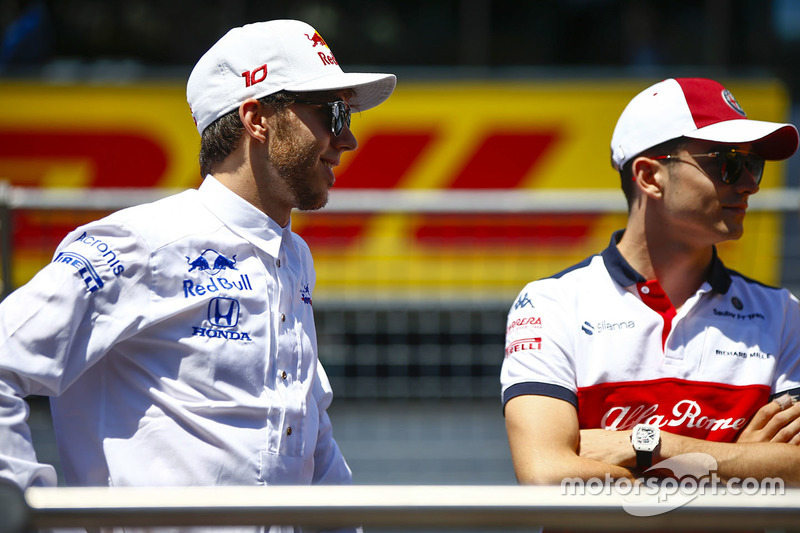 Pierre Gasly, Toro Rosso, and Charles Leclerc, Sauber, in the drivers parade