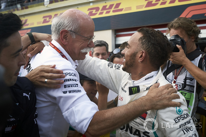 Lewis Hamilton, Mercedes AMG F1, 1st position, celebrates in Parc Ferme with Dr Dieter Zetsche, CEO, Mercedes Benz