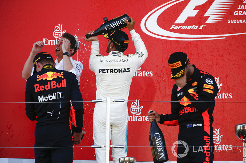 Max Verstappen, Red Bull, second place, Race winner Third place Lewis Hamilton, Mercedes AMG F1 Daniel Ricciardo, Red Bull Racing, celebrate with Champagne on the podium