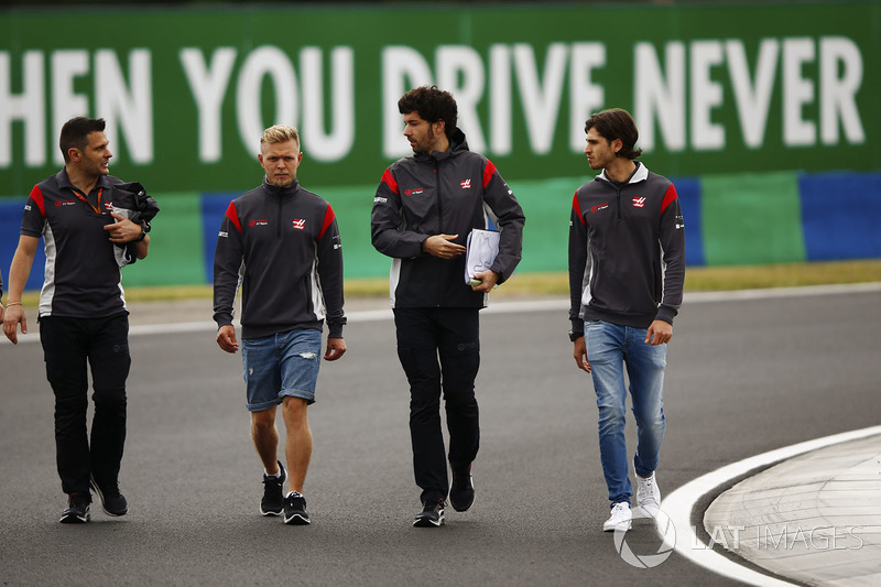 Kevin Magnussen, Haas F1 Team, Antonio Giovinazzi, Haas F1 Team test driver, conduct a track walk