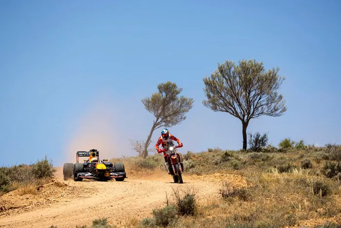 Daniel Ricciardo, Red Bull Racing RB7 with Daniel Sanders