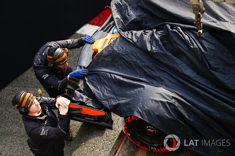 The McLaren MCL33 of Fernando Alonso is returned to the pits