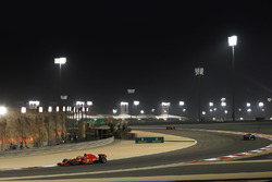 Sebastian Vettel, Ferrari SF71H, leads Valtteri Bottas, Mercedes AMG F1 W09, and Kimi Raikkonen, Fer