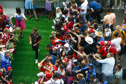 Romain Grosjean, Haas F1 Team, signs autographs for fans