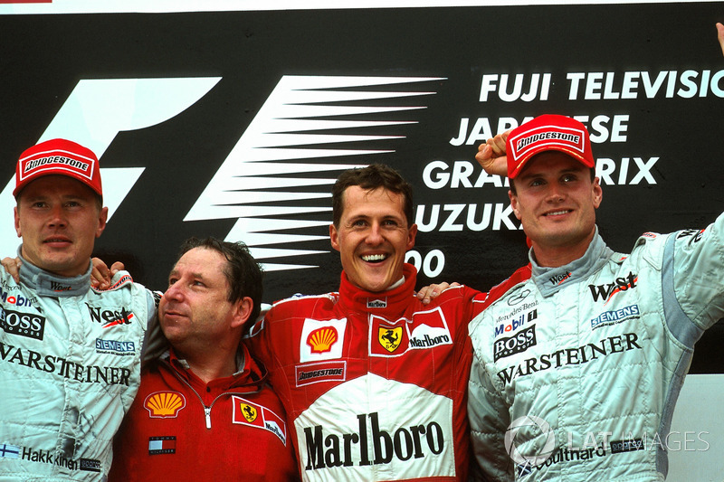 Podium: Mika Hakkinen second , Jean Todt, race winner Michael Schumacher, Ferrari F1 2000 and David Coulthard third