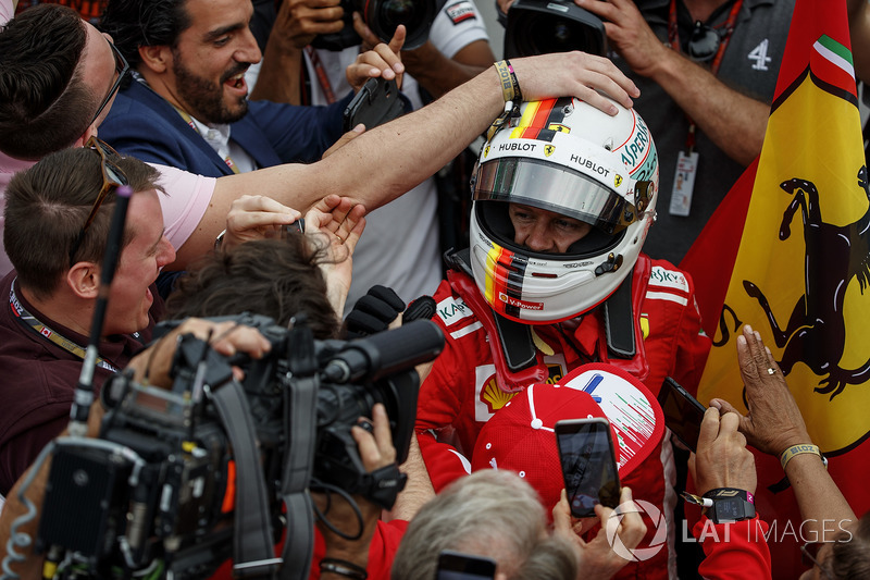 Sebastian Vettel, Ferrari, 1st position, celebrates in Parc Ferme with his team