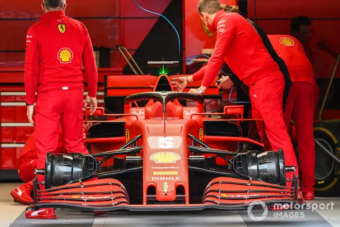 Ferrari mechanics with Ferrari SF1000 
