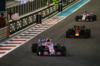 Esteban Ocon, Racing Point Force India VJM11, leads Max Verstappen, Red Bull Racing RB14, and Sergio Perez, Racing Point Force India VJM11
