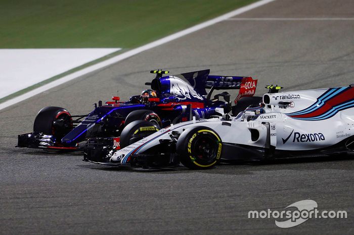Carlos Sainz Jr., Scuderia Toro Rosso STR12, batalla con Lance Stroll, Williams FW40