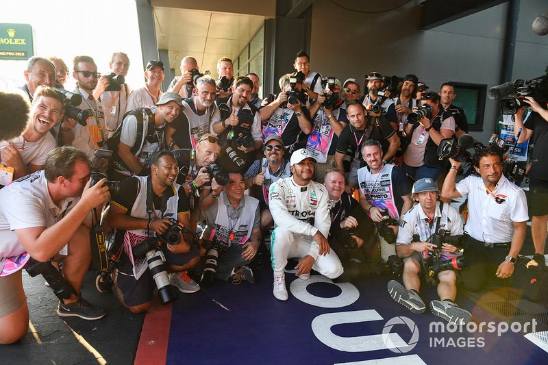 Pole Sitter Lewis Hamilton, Mercedes AMG F1 celebrates with the media