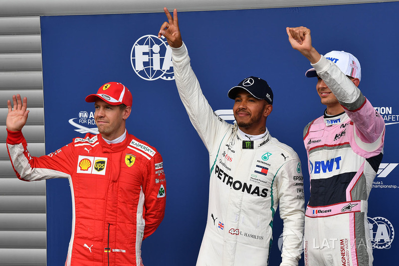 (L to R): Sebastian Vettel, Ferrari, Lewis Hamilton, Mercedes AMG F1 and Esteban Ocon, Racing Point Force India F1 Team celebrate in parc ferme