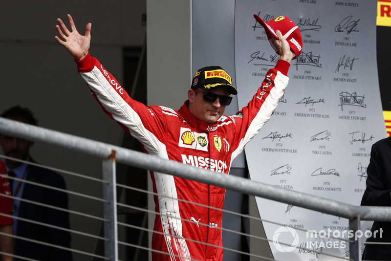 Kimi Raikkonen, Ferrari, 1st position, arrives on the podium