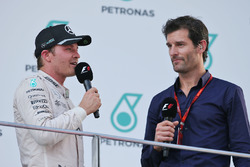 Nico Rosberg, Mercedes AMG F1 on the podium with Mark Webber, Porsche Team WEC Driver / Channel 4 Pr