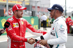 Sebastian Vettel, Ferrari, congratulates Lewis Hamilton, Mercedes AMG F1, after qualifying