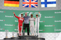 The podium (L to R): Sebastian Vettel, Ferrari, second; Lewis Hamilton, Mercedes AMG F1, race winner