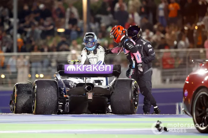 Esteban Ocon, Alpine A524, checks in on Franco Colapinto, Williams FW46, after they took each other out of the race