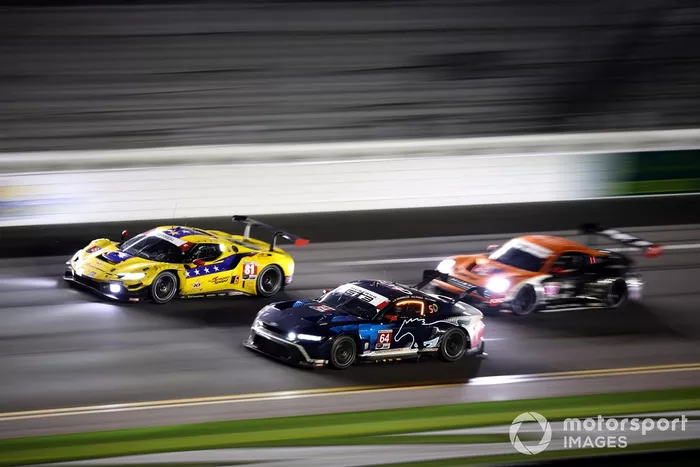 The #81 DragonSpeed Ferrari 296 GT3 of Albert Costa, Davide Rigon, Miguel Molina, and Thomas Neubauer races with #64 Ford Multimatic Motorsports Ford Mustang GT3: Mike Rockenfeller, Sebastian Priaulx, Austin Cindric