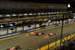 Sebastian Vettel, Ferrari SF70H, Max Verstappen, Red Bull Racing RB13 and Kimi Raikkonen, Ferrari SF70H crash at the start of the race