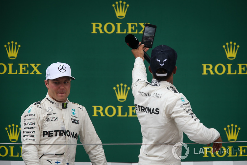 Valtteri Bottas, Mercedes AMG F1 and Lewis Hamilton, Mercedes AMG F1 celebrate on the podium