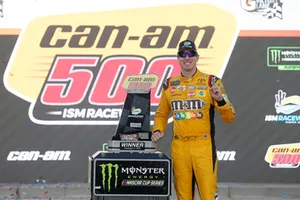 Race winner Kyle Busch, Joe Gibbs Racing, Toyota Camry M&M's