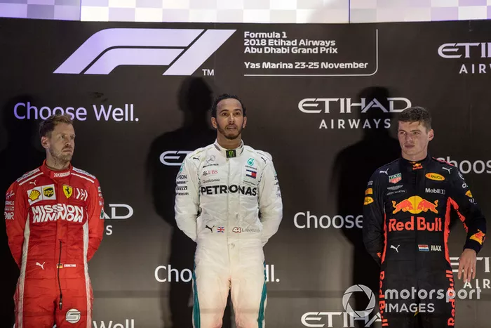 Podio: segundo lugar Sebastian Vettel, Ferrari y tercer lugar Max Verstappen, Red Bull Racing celebran
