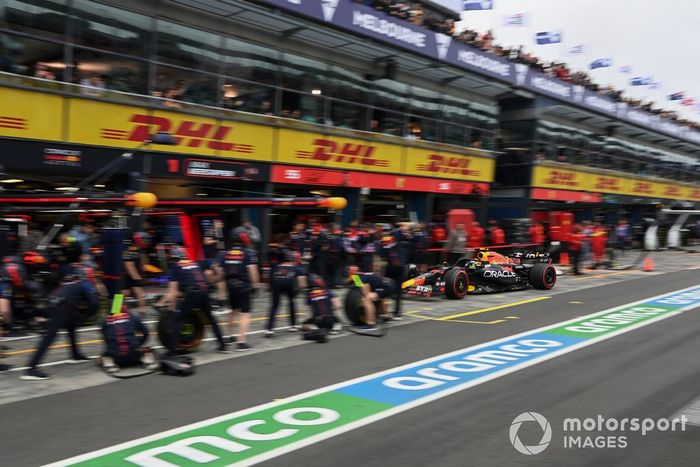 Sergio Perez, Red Bull Racing RB19, makes a pit stop during practice
