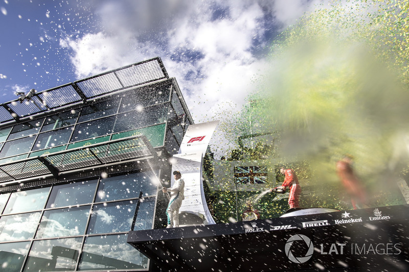 Lewis Hamilton, Mercedes-AMG F1, Sebastian Vettel, Ferrari and Kimi Raikkonen, Ferrari celebrate on