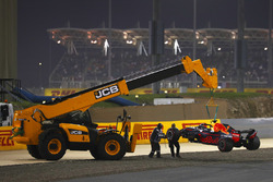 The car of Daniel Ricciardo, Red Bull Racing RB14 Tag Heuer, is recovered
