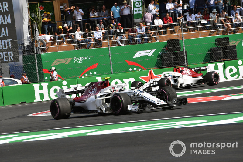 Charles Leclerc, Alfa Romeo Sauber C37 leads Marcus Ericsson, Alfa Romeo Sauber C37