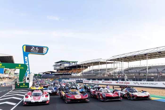 Group photo with all cars