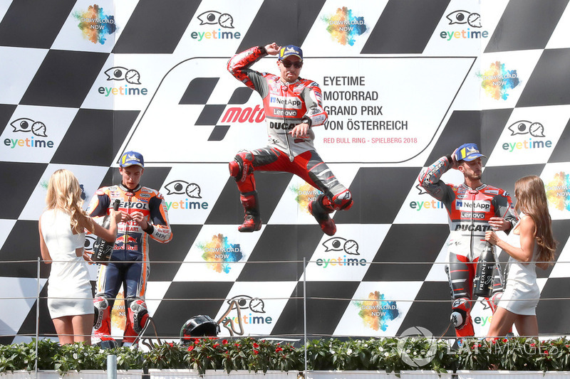 Podio: il secondo classificato Marc Marquez, Repsol Honda Team, il vincitore della gara Jorge Lorenzo, Ducati Team, il terzo classificato Andrea Dovizioso, Ducati Team