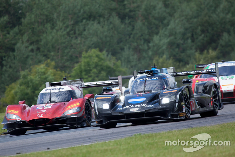 #10 Wayne Taylor Racing Cadillac DPi: Ricky Taylor, Jordan Taylor, #55 Mazda Motorsports Mazda DPi: Jonathan Bomarito, Tristan Nunez