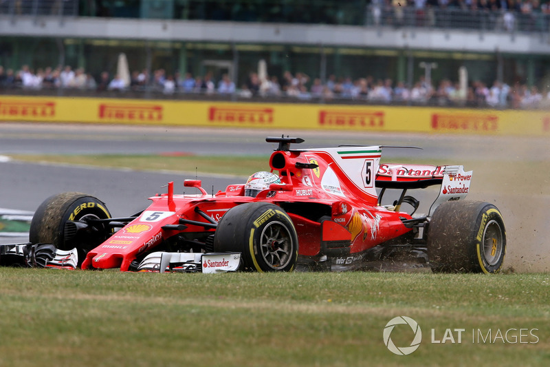 Sebastian Vettel, Ferrari SF70H, with a front puncture