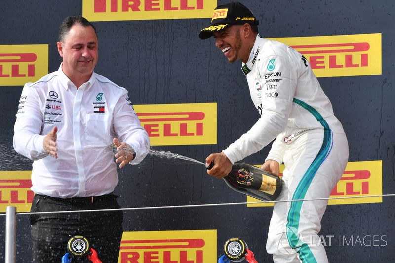 Ron Meadows, Mercedes AMG F1 Team Manager and Lewis Hamilton, Mercedes-AMG F1 celebrate on the podium with the champagne