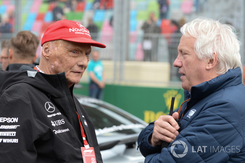 Niki Lauda, Mercedes AMG F1 Non-Executive Chairman and Charlie Whiting, FIA Delegate on the grid