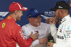 I primi 3 qualificati: Sebastian Vettel, Ferrari, Valtteri Bottas, Mercedes AMG F1, e Lewis Hamilton, Mercedes AMG F1