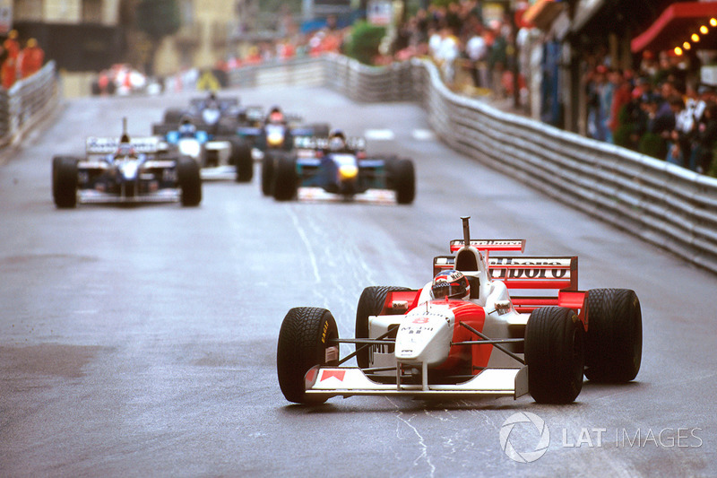 David Coulthard, McLaren MP4/11B, wearing Michael Schumacher's spare helmet