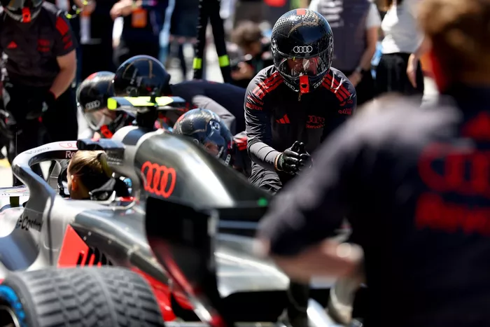 Audi F1 Team pit stop practice.