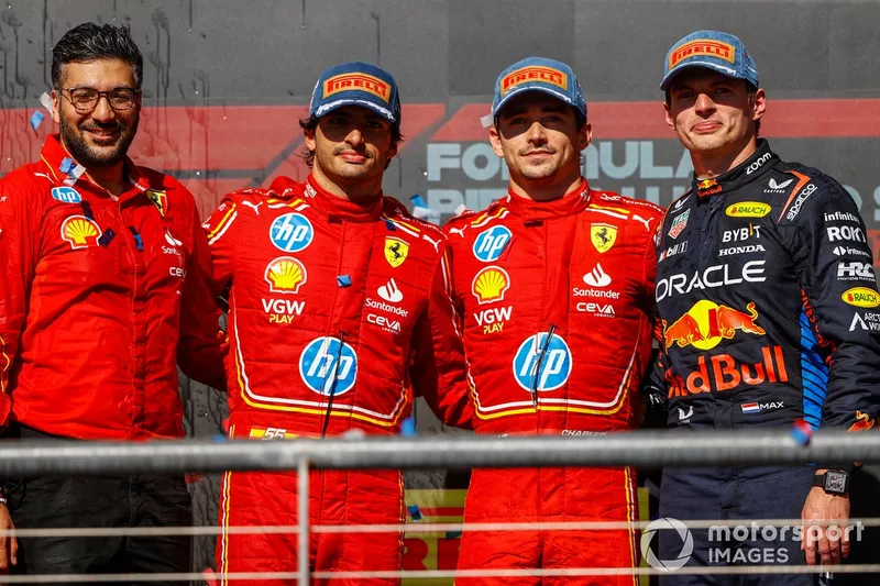 Charles Leclerc, Scuderia Ferrari, 1st position, Carlos Sainz, Scuderia Ferrari, 2nd position, Max Verstappen, Red Bull Racing, 3rd position, on the podium 
