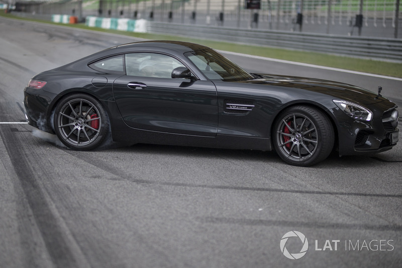 Lewis Hamilton, Mercedes AMG F1 in a Mercedes AMG GTS