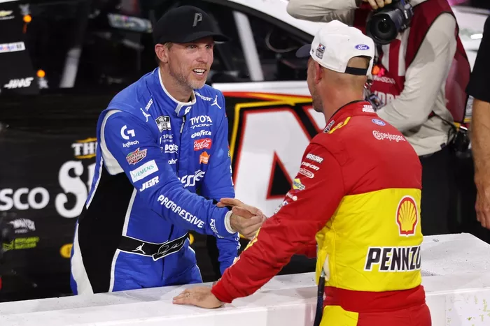Joey Logano and Denny Hamlin shake hands after race