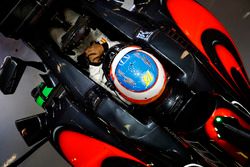 Fernando Alonso, McLaren MP4-31 in his cockpit in the garage