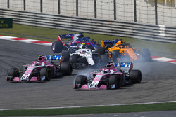 Sergio Perez, Force India VJM11 Mercedes, leads Esteban Ocon, Force India VJM11 Mercedes, Sergey Sirotkin, Williams FW41 Mercedes, Stoffel Vandoorne, McLaren MCL33 Renault, and Brendon Hartley, Toro Rosso STR13 Honda