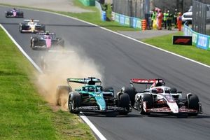 Lance Stroll, Aston Martin Racing, Esteban Ocon, Haas F1 Team